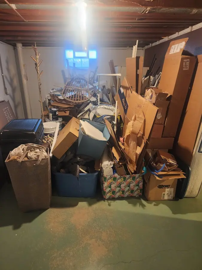 Roll-off dumpster container at job site for Construction Dumpster Rental in Lenox